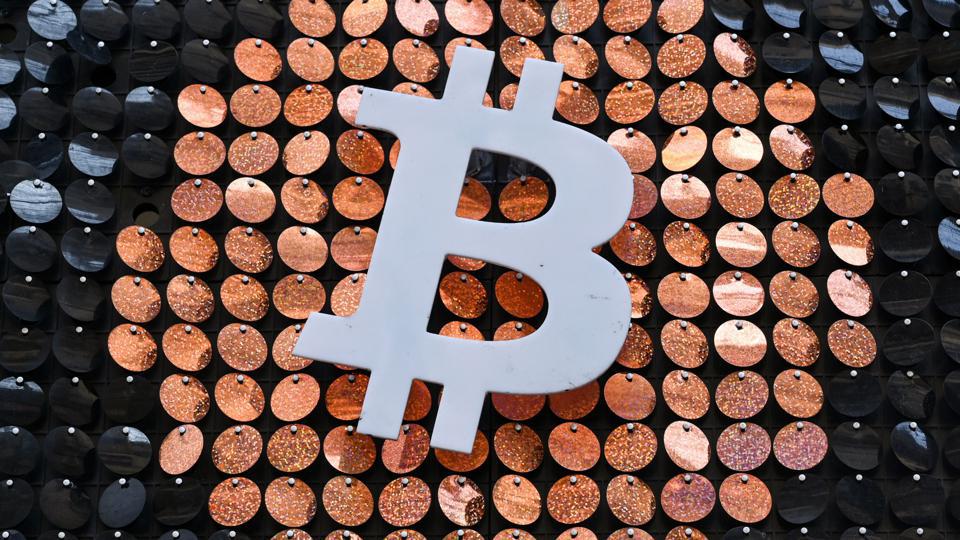 Bitcoin’s bull run screeches to a halt; drops 7 per cent in a day to trade at $67, | Mint