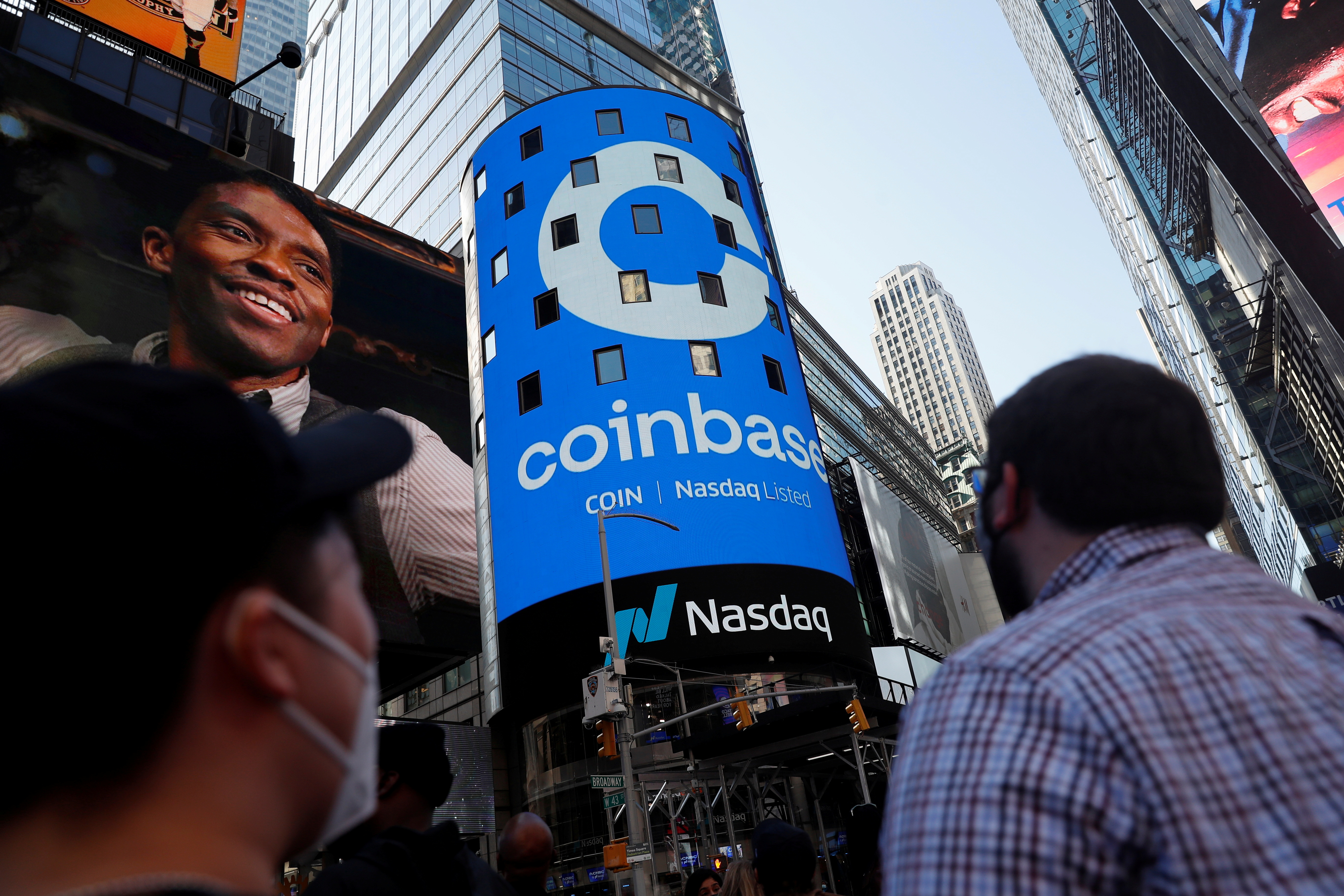 Crypto exchange Coinbase stops short of blanket ban on Russian accounts | Reuters
