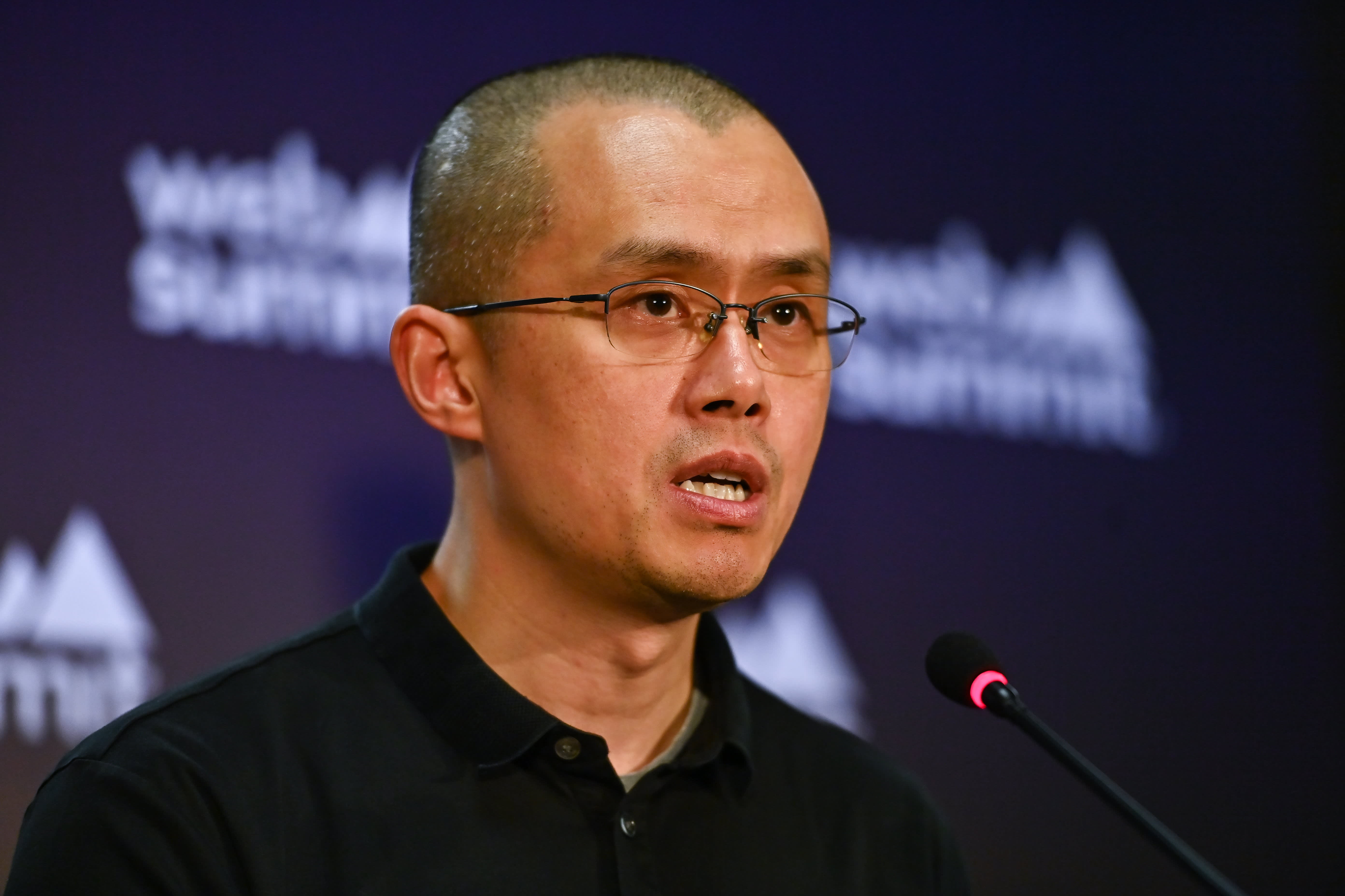 Binance's Zhao pleads guilty, steps down to settle US illicit finance probe | Reuters